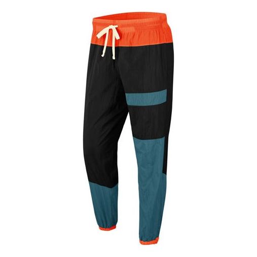 Tepláky Nike Flight Woven Pants Rôznofarebný | CN8513-013