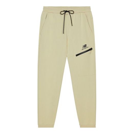 Tepláky New Balance Print Sweatpants Béžová | AMP13356-BEI, 0