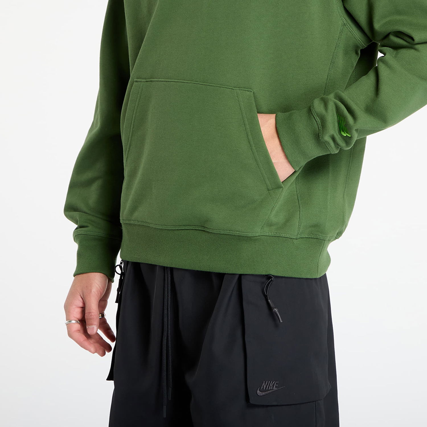 Mikina New Balance Hoodie with 'Runners aren't normal' Slogan Zelené | NBMT53918DAE, 1