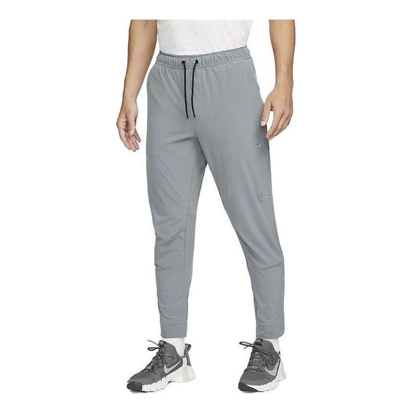 Tepláky Nike Zippered Cuff Versatile Training Pants Šedá | FB7549-084
