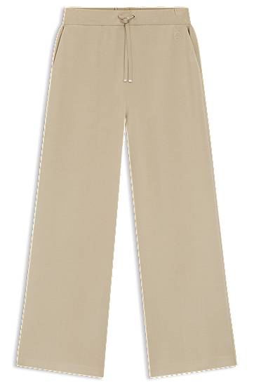 Tepláky BOSS Relaxed-fit tracksuit bottoms with Double B monogram Béžová | 50556952, 0