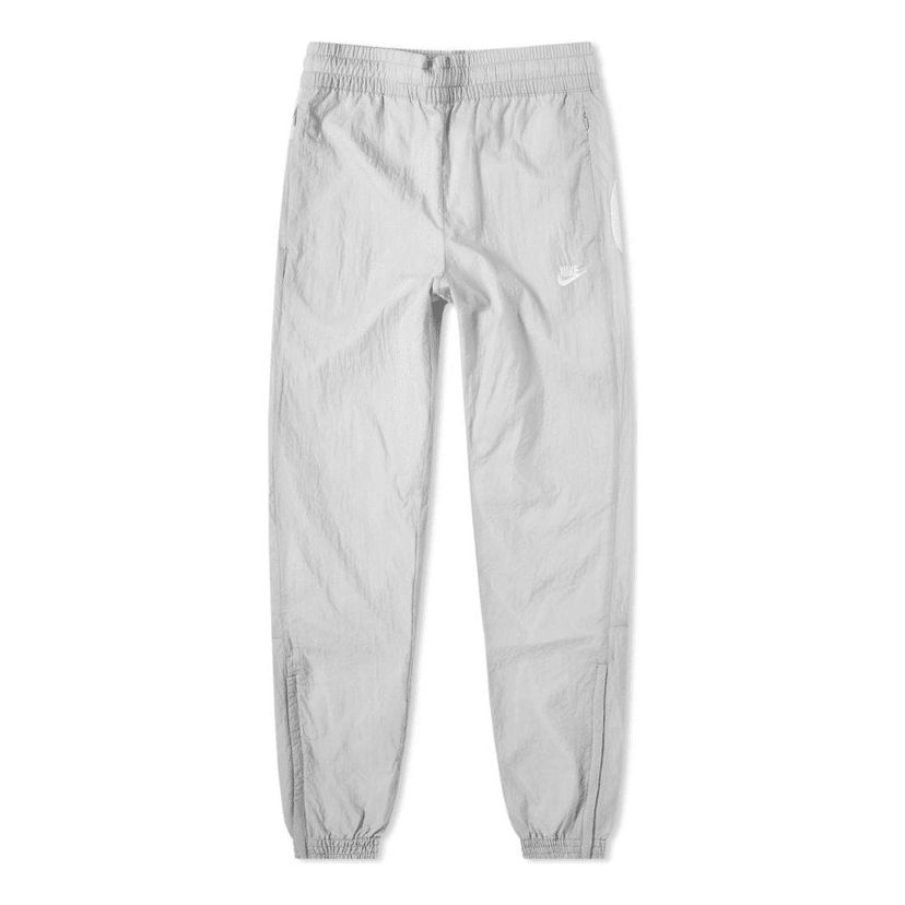 Tepláky Nike Sportswear Reverse Swoosh Woven Pants Šedá | AJ2300-012