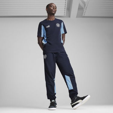 Tepláky Puma Manchester City ftblARCHIVE Woven Pants Navy | 779132_73, 2