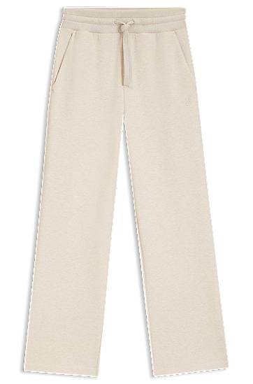 Tepláky BOSS Cotton-jersey tracksuit bottoms with Double B monogram Béžová | 50524502