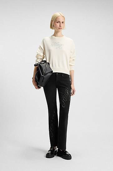 Džínsy BOSS Slim-fit Denim Jeans with Rhinestone Slogan Čierna | 50546333, 1