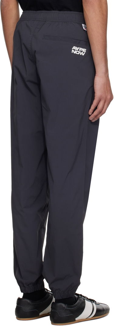 Tepláky AAPE by A Bathing Ape AAPE by A Bathing Ape 'AAPE Now' Woven Sweatpants Šedá | AAPPTMB664XXO, 2