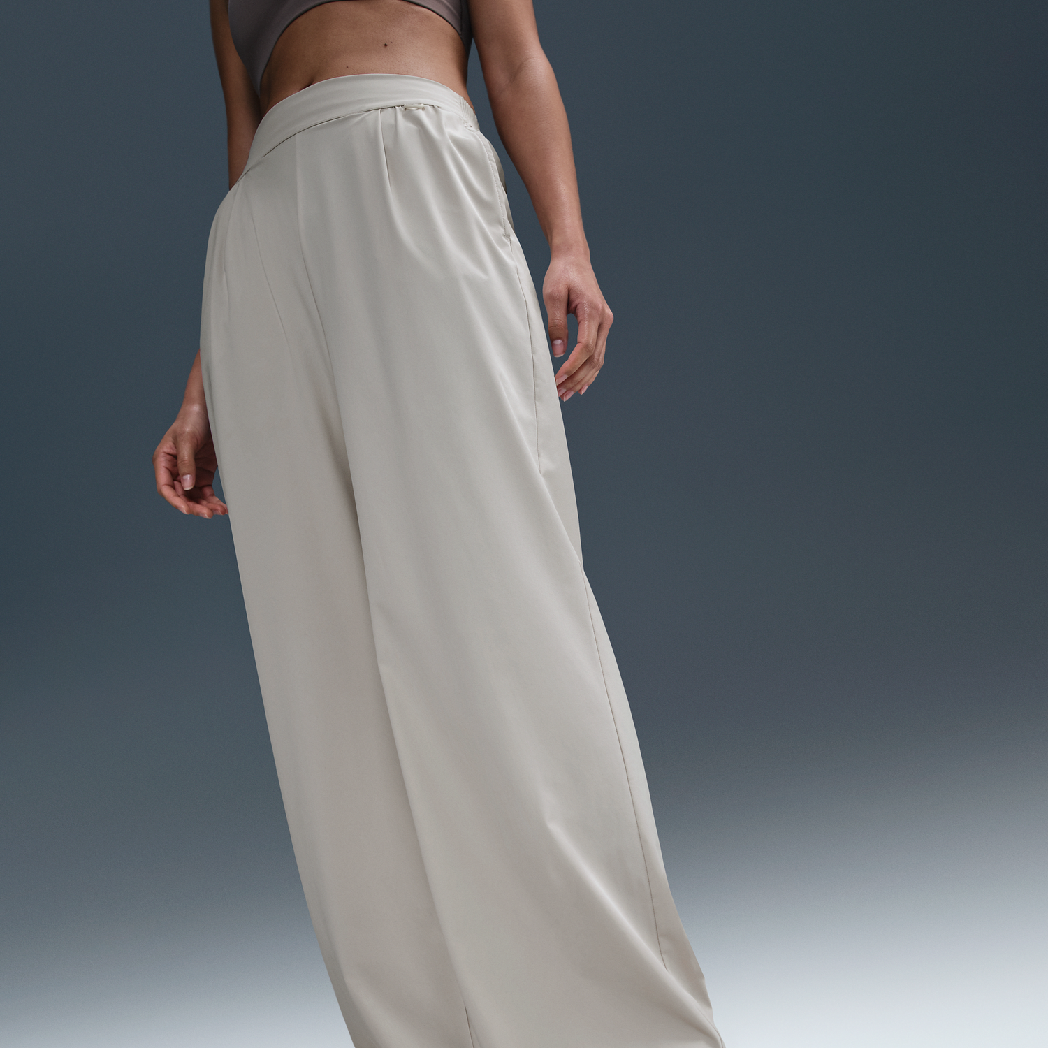 Nohavice Nike Dri-FIT 24.7 PerfectStretch High-Waisted Wide-Leg Pants Béžová | HM8389-104, 1