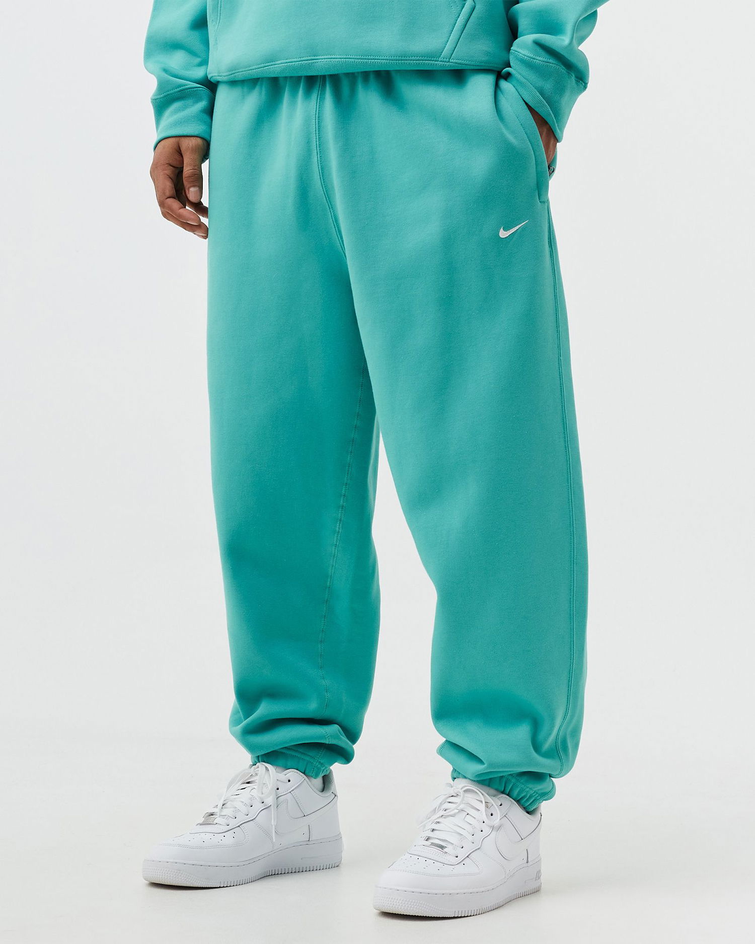 Tepláky Nike Solo Swoosh Fleece Pants Tyrkysová | CW5460-393, 1