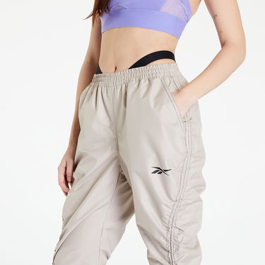 Nohavice a džínsy Reebok Woven Pants Beige x Cardi B Béžová | HM5047, 2
