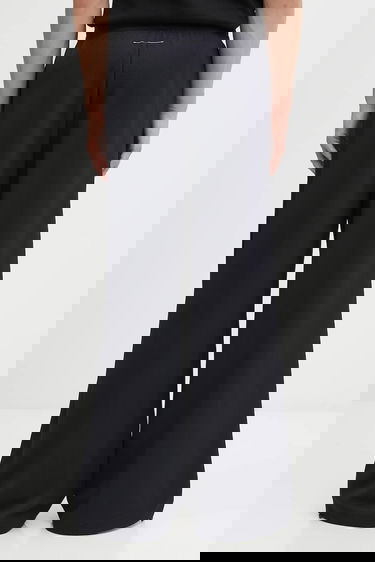 Nohavice Maison Margiela MM6 Maison Margiela x Salomon Waffle-Knit Wide-Leg Trousers Čierna | SH0KA0058.M20139.899, 2