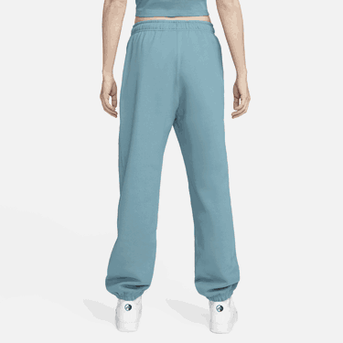 Tepláky Nike Solo Swoosh Tyrkysová | CW5565-440, 2