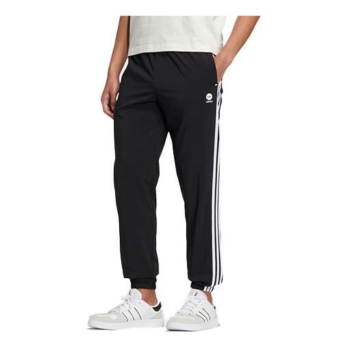 Nohavice adidas Originals Neo Casual Woven Stripe Pants Čierna | HS6839