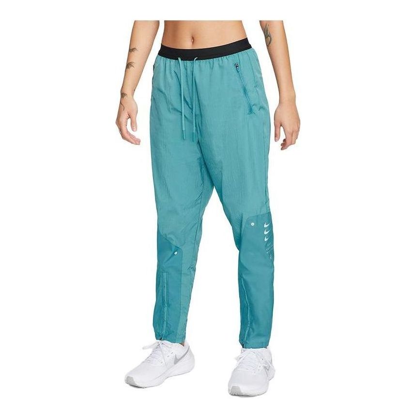 Nohavice Nike Therma-Fit Training Woven Trousers Tyrkysová | DX5554-440, 0