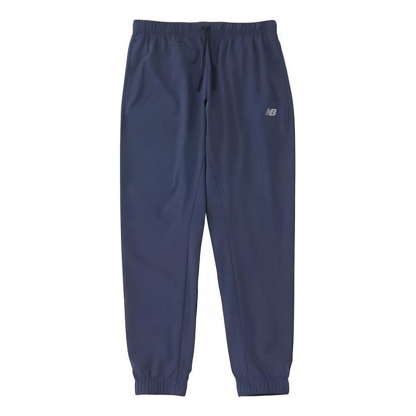Tepláky New Balance Sport Essentials Woven Joggers Modrá | MP41011-NNY