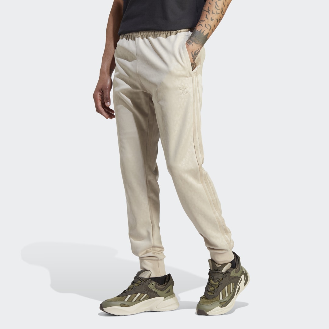 Tepláky adidas Originals Graphics Monogram SST Track Pants Béžová | IJ5690, 1