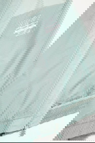 Bomber bunda Maison Margiela MM6 Maison Margiela x Salomon Transitional Translucent Bomber Jacket Tyrkysová | S52AM0327, 4