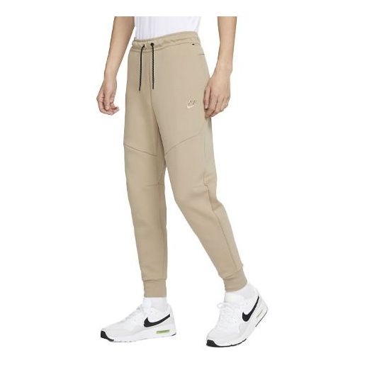 Tepláky Nike Fleece Graphic Joggers Béžová | DX0582-247