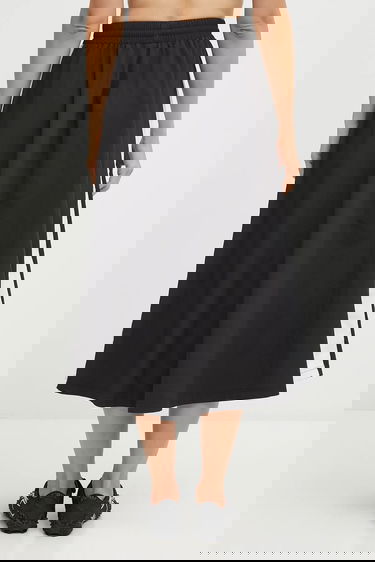 Sukňa Puma Midi A-line Skirt with Elastic Waist and Side Stripe Čierna | 633438, 2