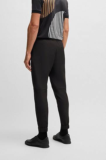 Tepláky BOSS Water-Repellent Tapered Stretch Trousers Čierna | 50534313, 1