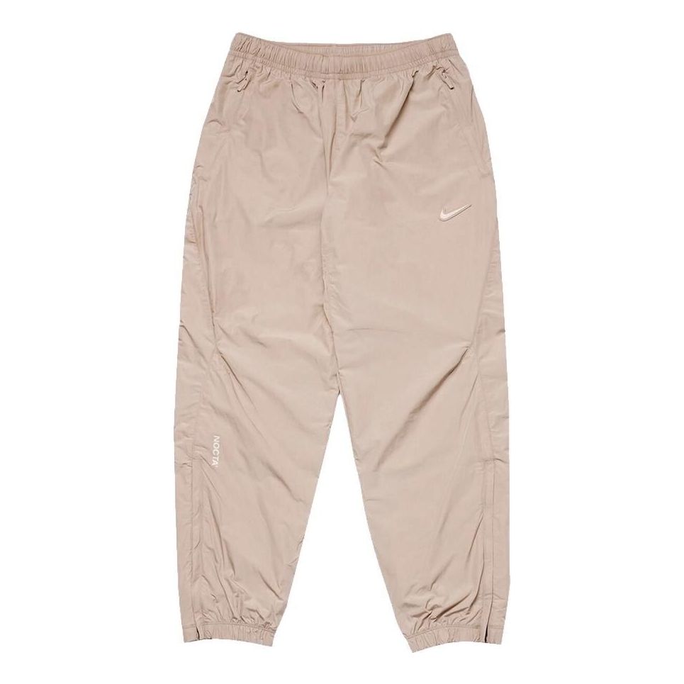 Tepláky Nike Drake NOCTA Nylon Track Pants Béžová | FN7669-200, 0