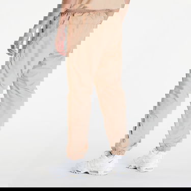 Nohavice Nike x NOCTA NRG CS WOVEN TRACK PANT Béžová | FN7668-200, 1