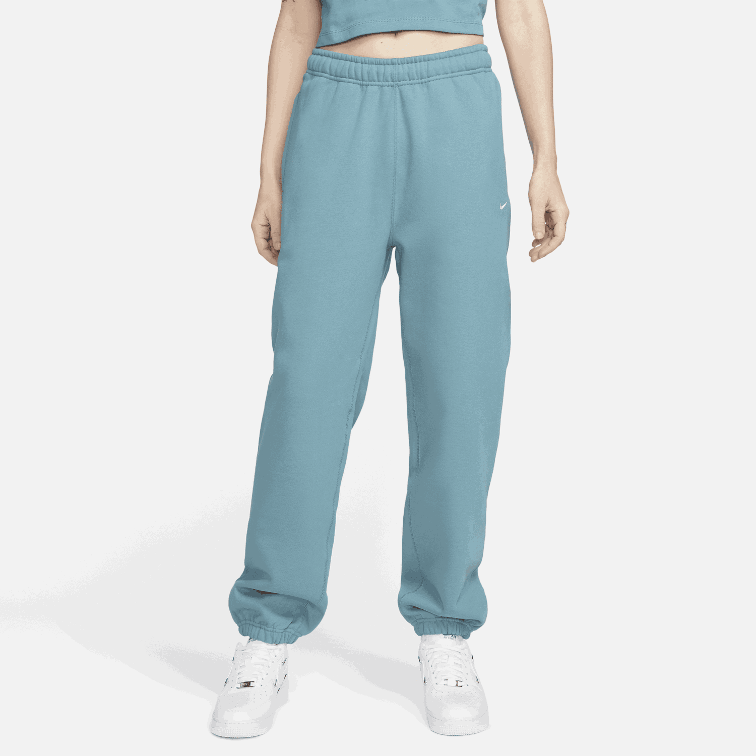 Tepláky Nike Solo Swoosh Tyrkysová | CW5565-440, 0