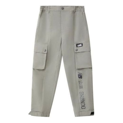 Cargo nohavice New Balance Tyakasha Cargo Pants Zelené | NTA4N431-GR
