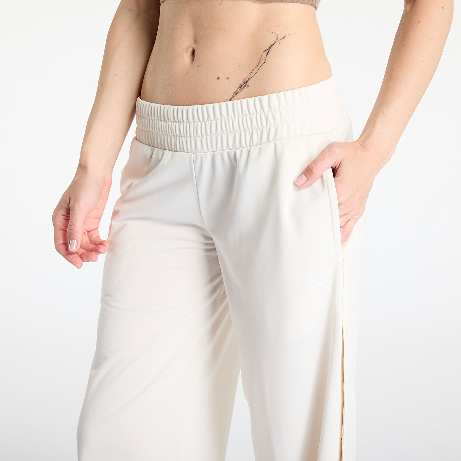 Nohavice Puma Wardrobe Essentials Low Rise Popper Pants Béžová | 62980487, 1