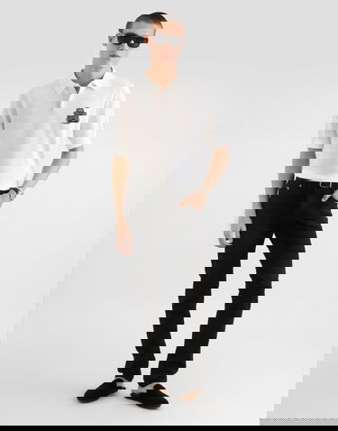 Polo tričko Dolce & Gabbana Knitted Cotton Polo Shirt with DG Milano Emblem Biela | GXZ02ZJBCIUW0111, 1