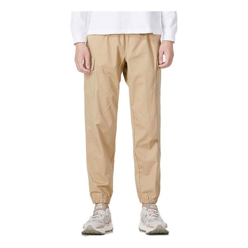 Cargo nohavice New Balance Athletics Woven Cargo Pants Béžová | AMP13501-INC