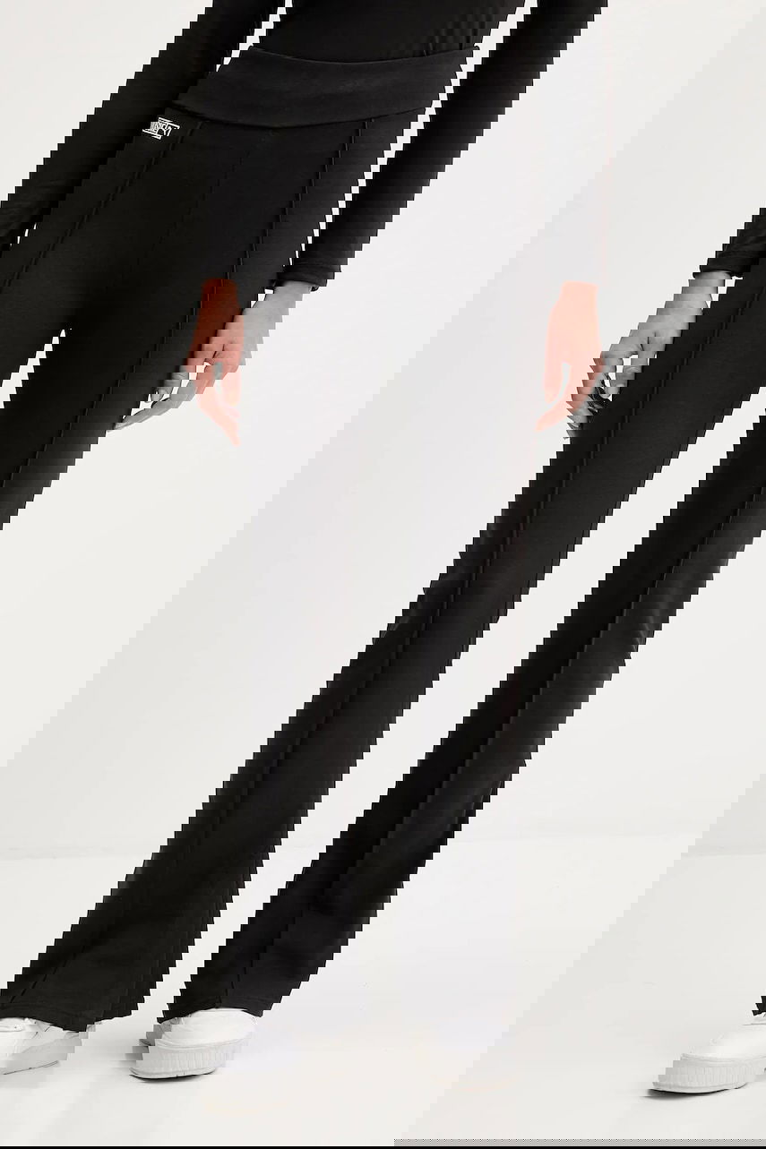 Legíny Puma PUMA x ROSÉ Flared Leggings with Front Seam Čierna | 635156, 0