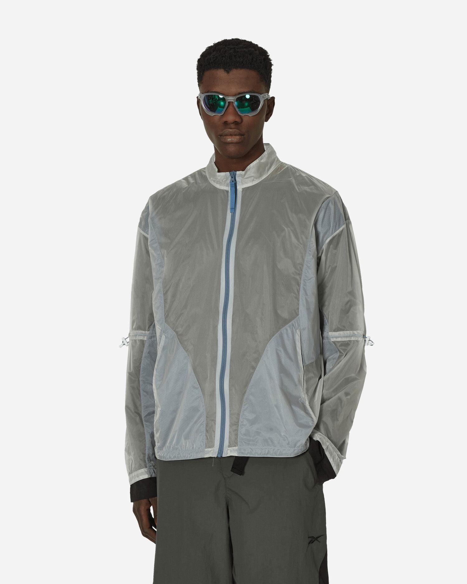 Bunda Reebok See Through Jacket Crystal Blue Šedá | RMEA006C99FAB001, 0