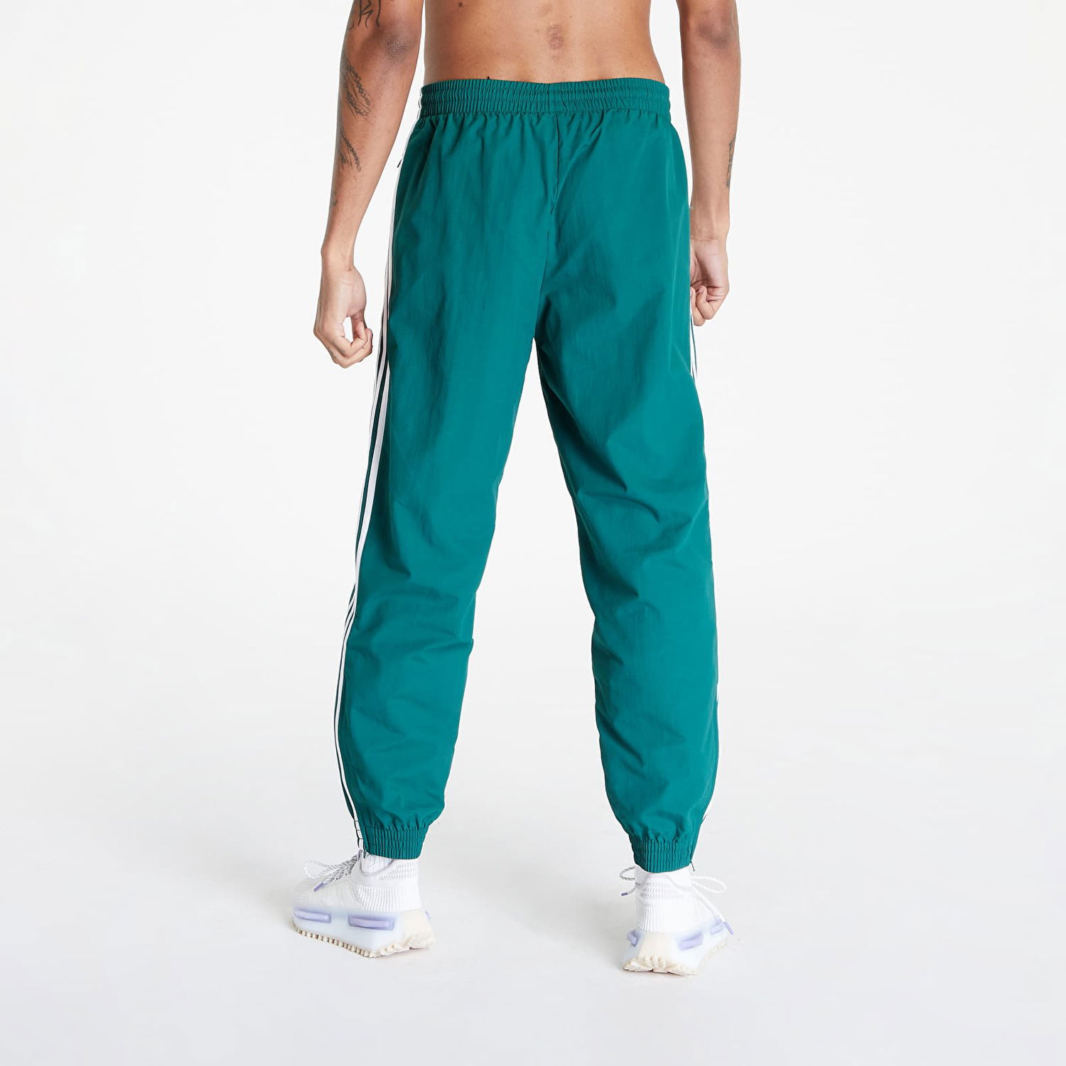 Nohavice a džínsy adidas Originals adidas Woven Fbird Track Zelené | IT2497, 1