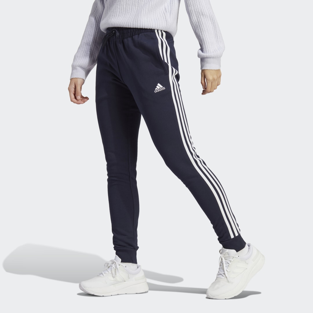 Nohavice a džínsy adidas Originals Kalhoty Essentials Čierna | IC9923, 0