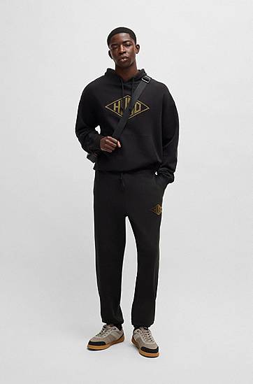 Tepláky BOSS Cotton-Terry Tracksuit Bottoms with Embroidered Logo Čierna | 50534952, 1