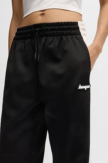 Tepláky BOSS Retro Tracksuit Bottoms with Side Stripe Čierna | 50537080, 1