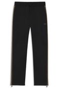 Relaxed-fit tracksuit bottoms with logo tape and ankle zippers