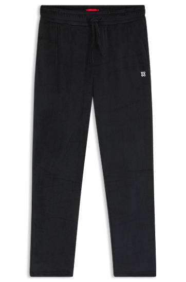 Tepláky BOSS Ribbed-velvet Drawstring Tracksuit Bottoms with Stacked Logo Label Čierna | 50549838