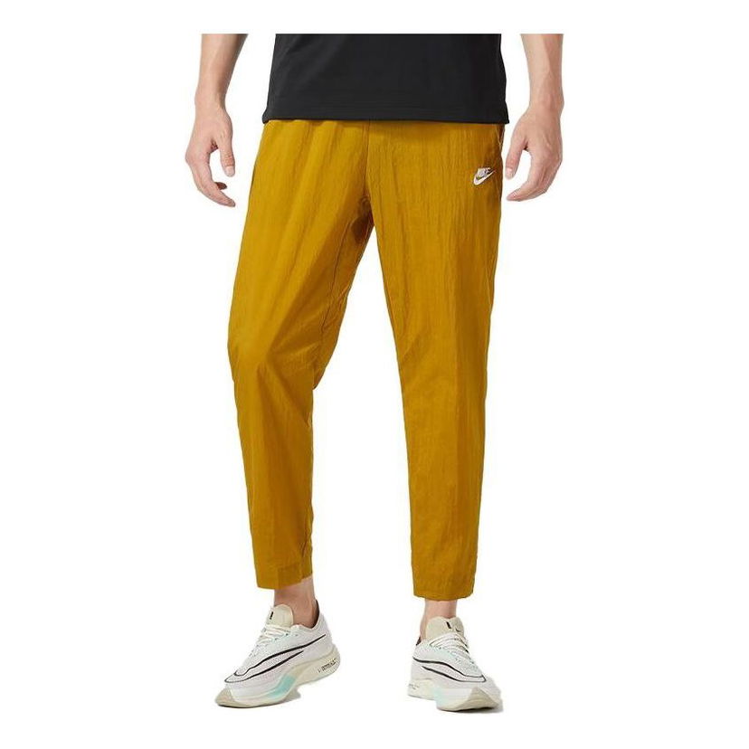Cargo nohavice Nike Club Lightweight Woven Trousers Žltá | FB7407-716
