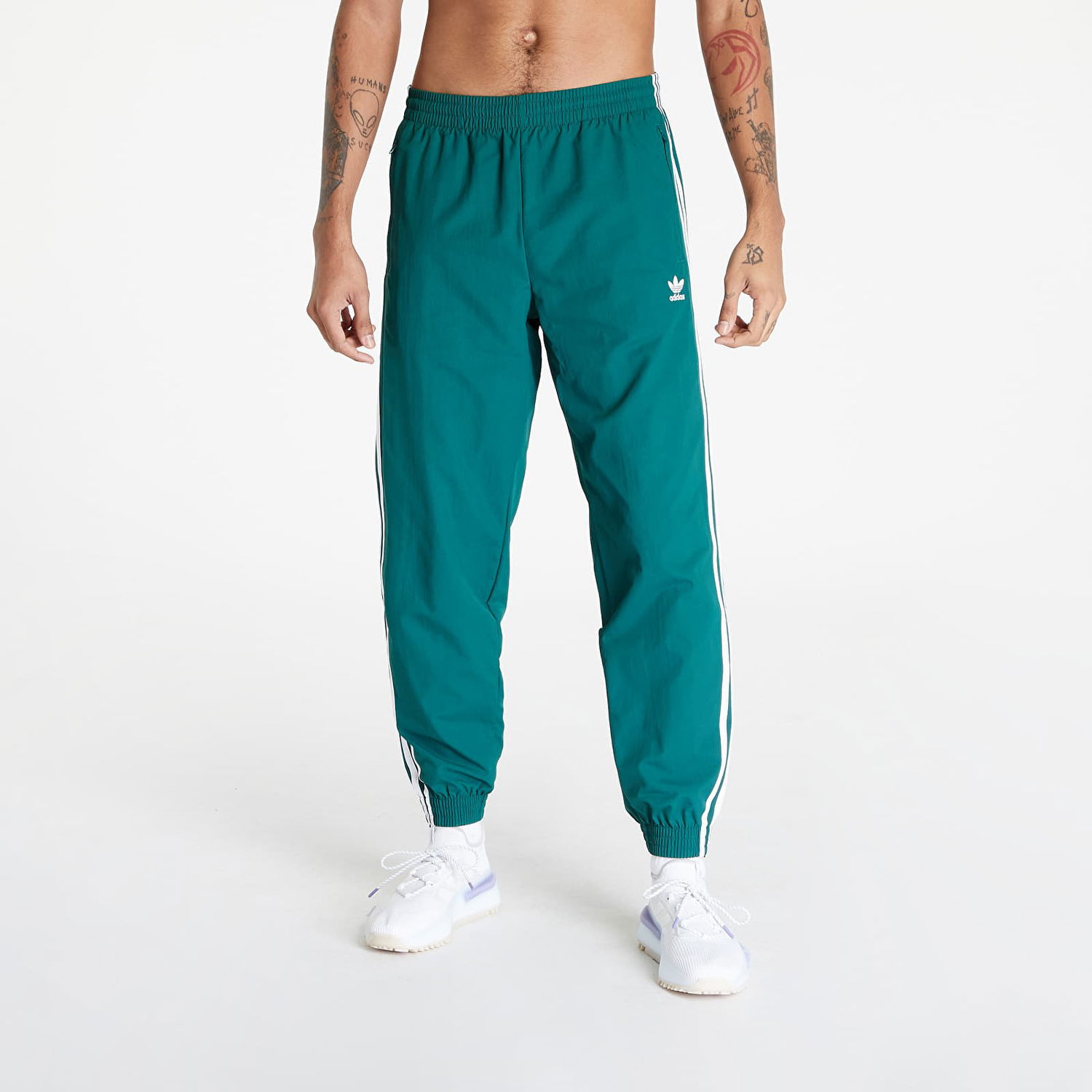 Nohavice a džínsy adidas Originals adidas Woven Fbird Track Zelené | IT2497, 0