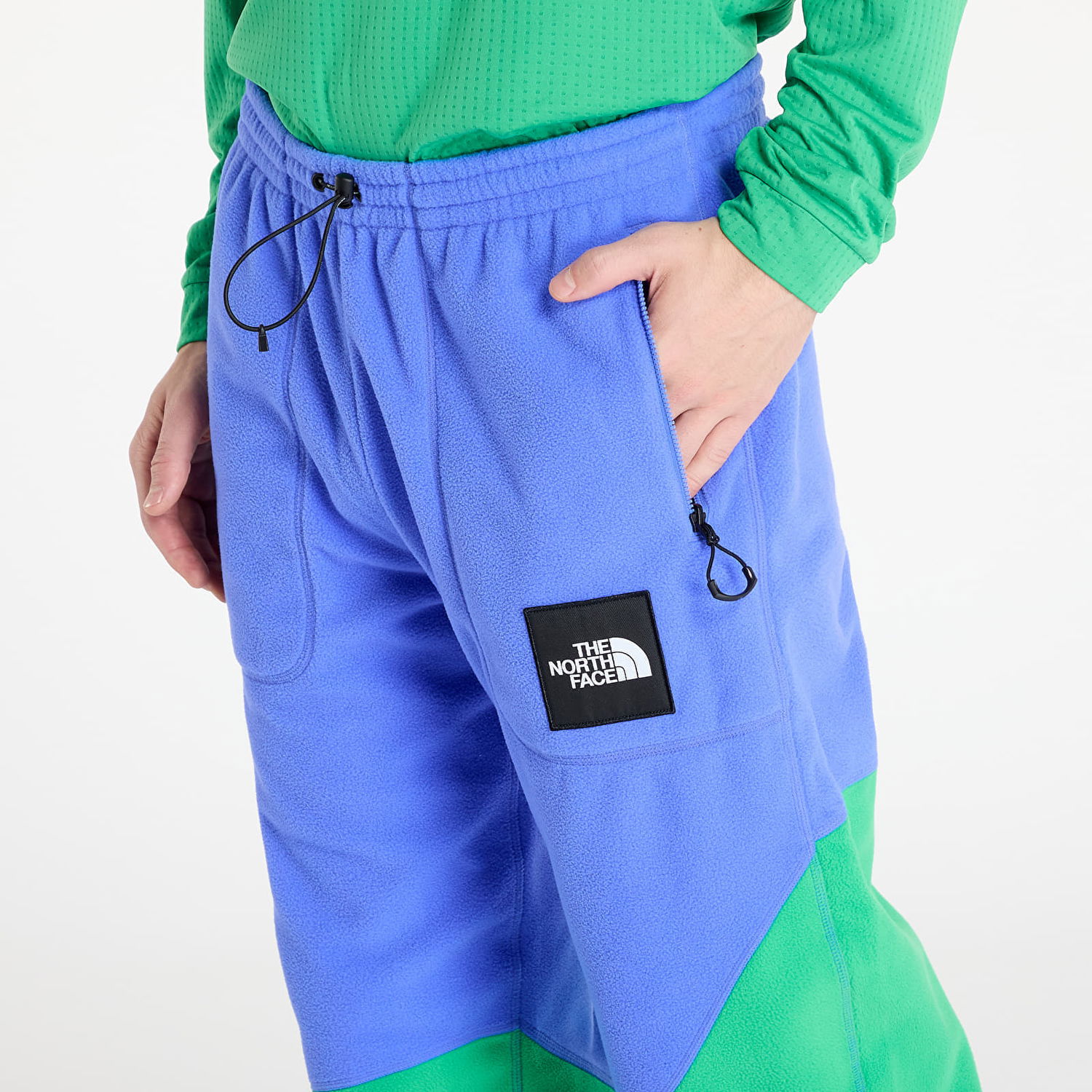 Tepláky The North Face Yinka Ilori x Fleece Pant Solar Blue/ Optic Emerald Zelené | NF0A89GG0IG1, 1