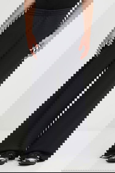 Nohavice Maison Margiela MM6 Maison Margiela x Salomon Waffle-Knit Wide-Leg Trousers Čierna | SH0KA0058.M20139.899, 0