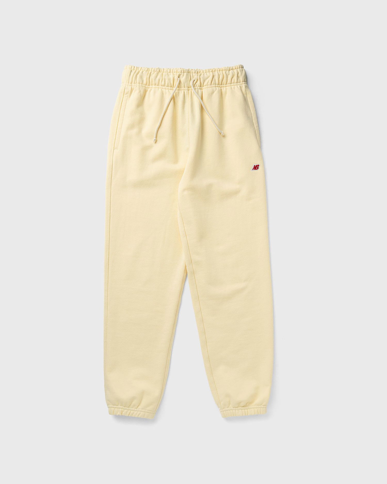 Tepláky New Balance Core Sweatpants Žltá | MP43547-CAU, 0