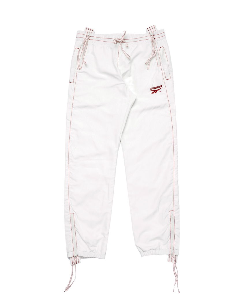 Nohavice Reebok Kanghyuk x TRACK PANTS Biela | RMCJ008C99FAB0010300