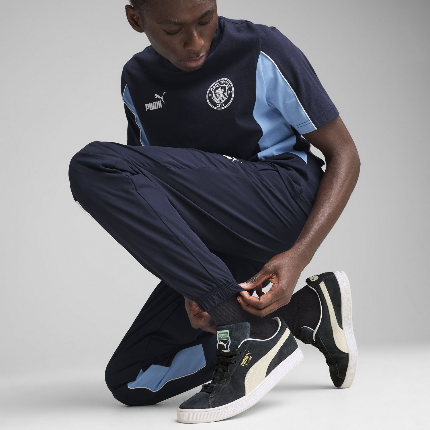 Tepláky Puma Manchester City ftblARCHIVE Woven Pants Navy | 779132_73, 1
