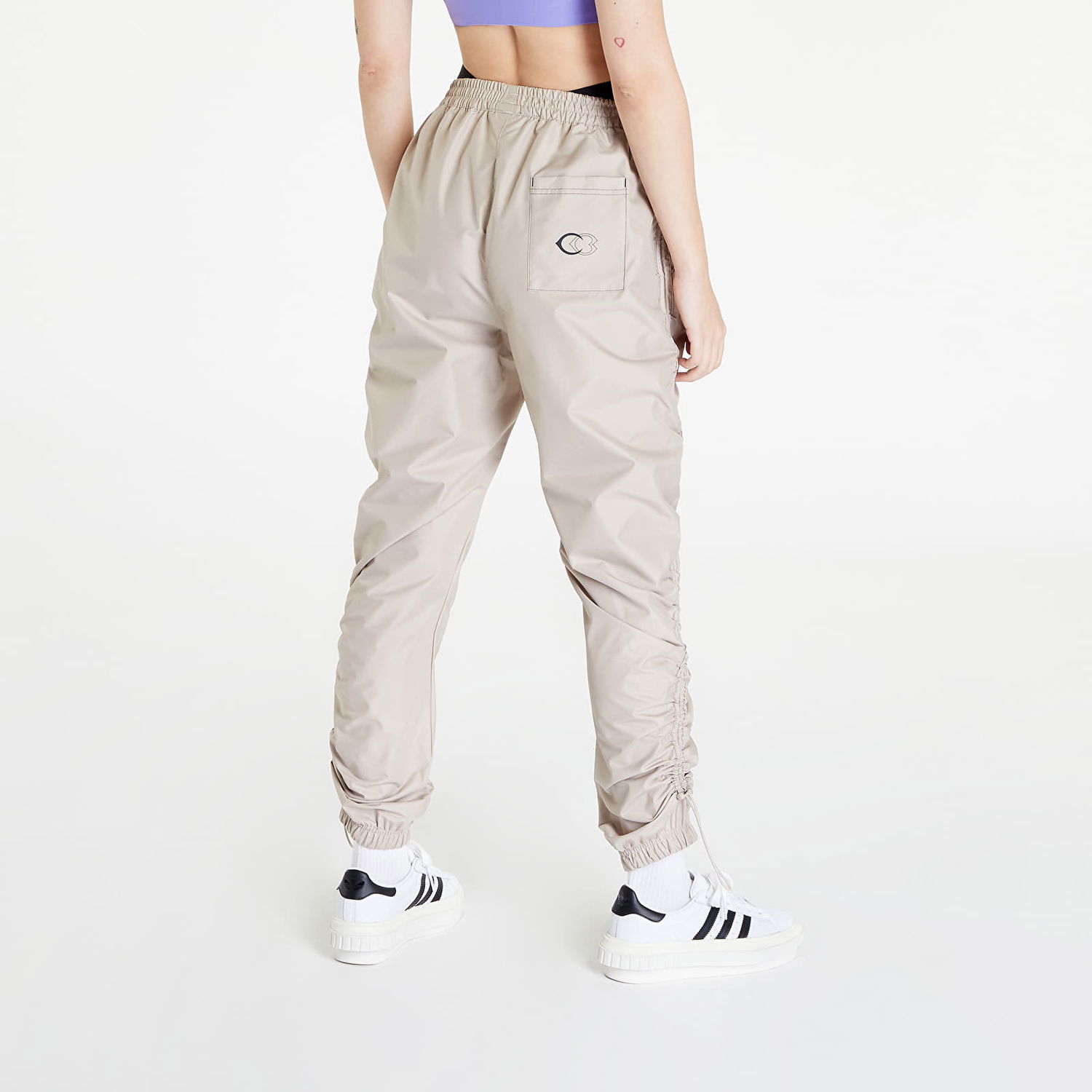 Nohavice a džínsy Reebok Woven Pants Beige x Cardi B Béžová | HM5047, 1
