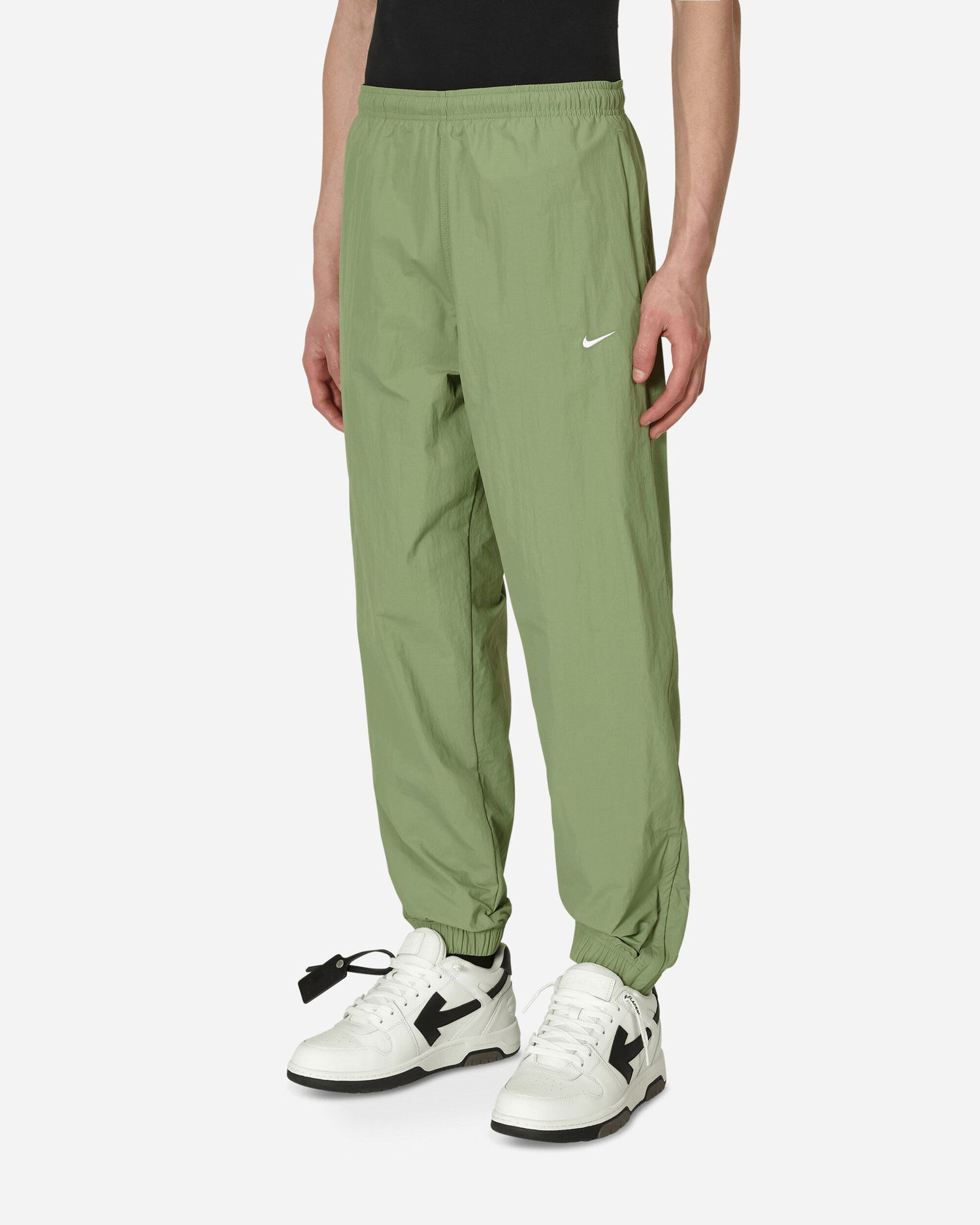 Nohavice Nike Solo Swoosh Woven Track Pants Zelené | DQ6571-386, 1
