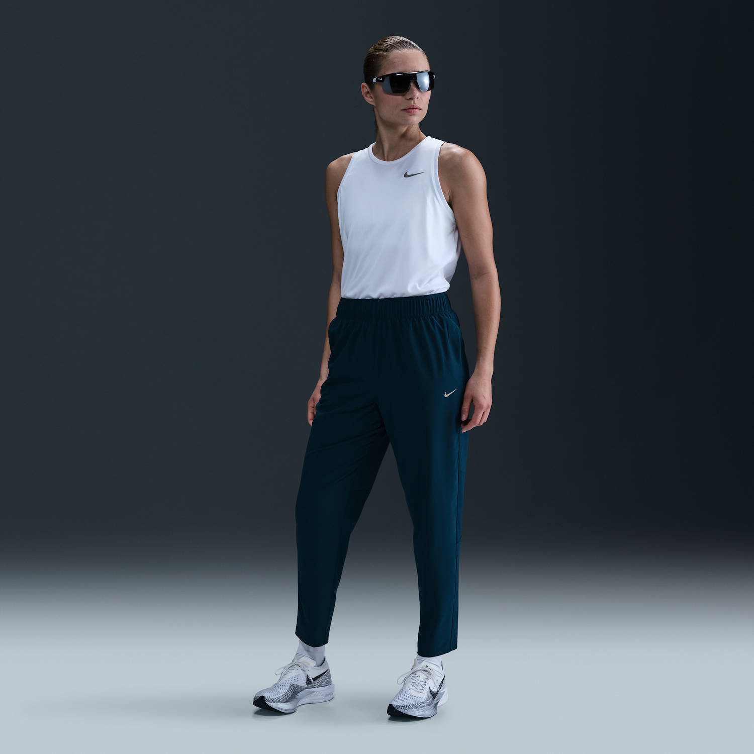 Nohavice Nike Dri-FIT Fast 7/8 Running Pants with Mid-Rise Waist Navy | FB7029-478, 1