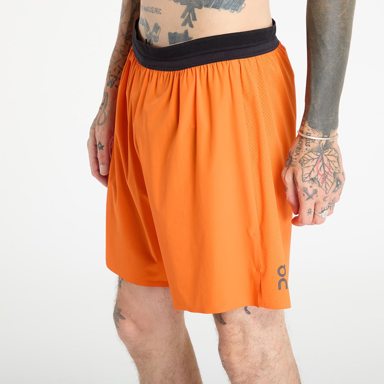 Šortky On Running 7" Performance Running Shorts Oranžová | 1MF10100861, 0