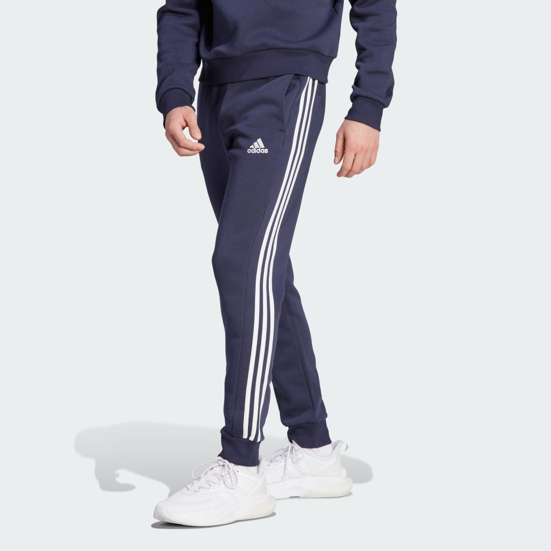 Tepláky adidas Originals Essentials Fleece 3-Stripes Tapered Cuff Pants Navy | IJ6493, 1
